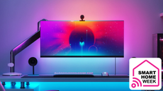Nanoleaf 4D illuminating the wall behind a computer screen