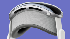 The Apple Vision Pro on a violet background